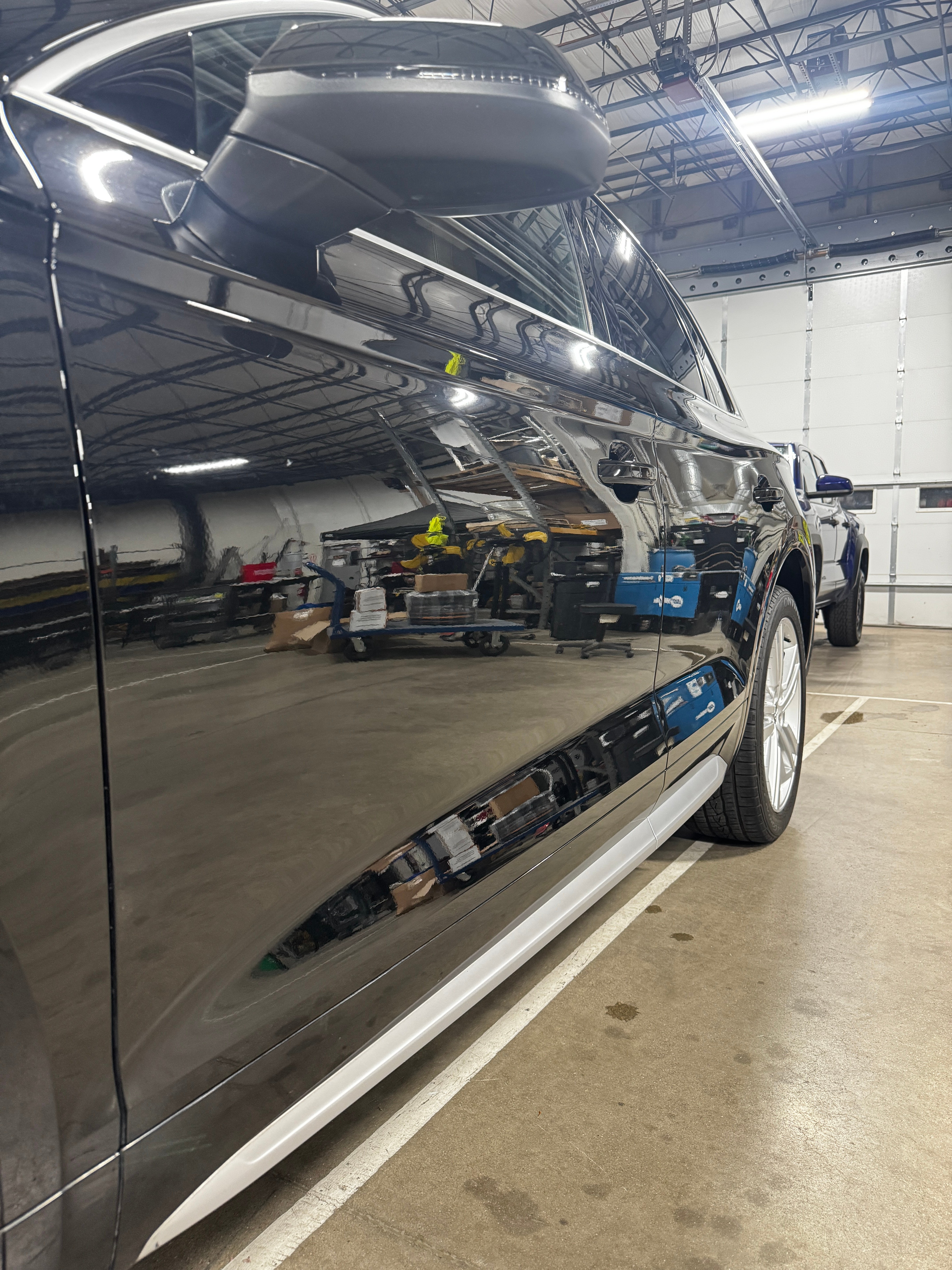 Ceramic coating application on black SUV - Signature Auto Detailing